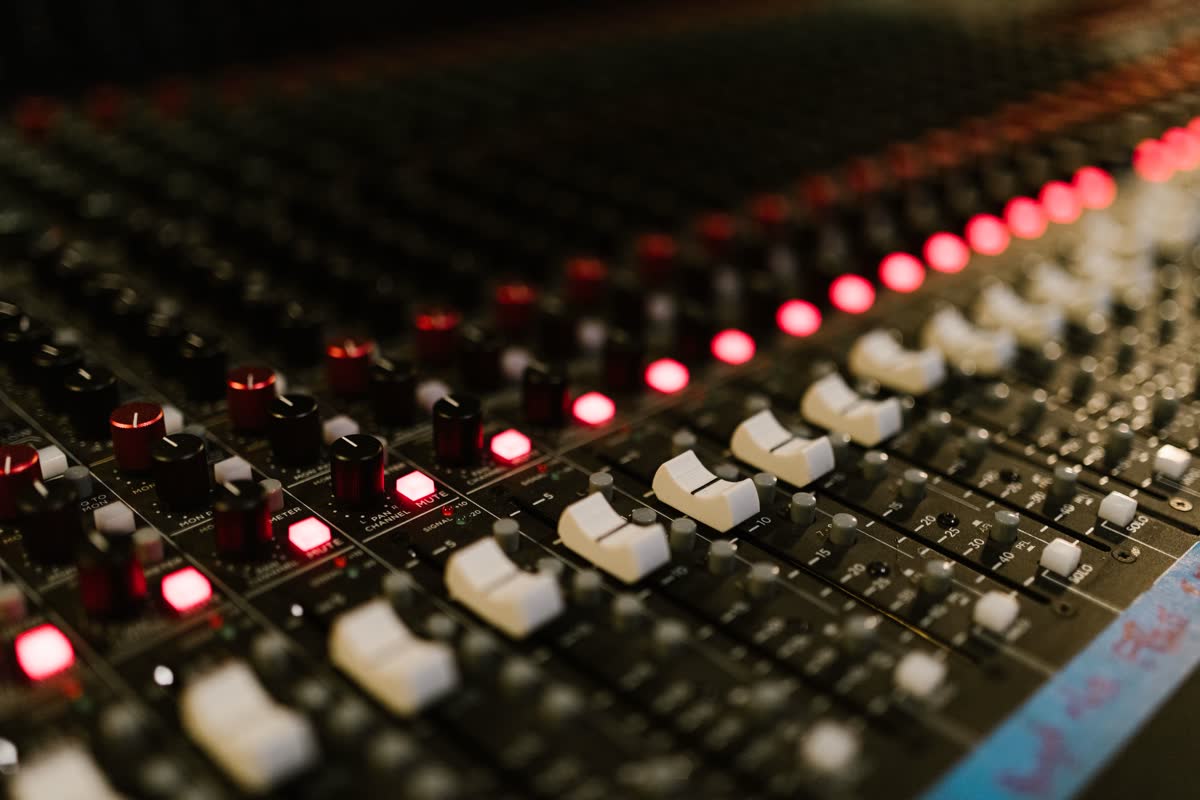 Analog mixing console with red mute buttons